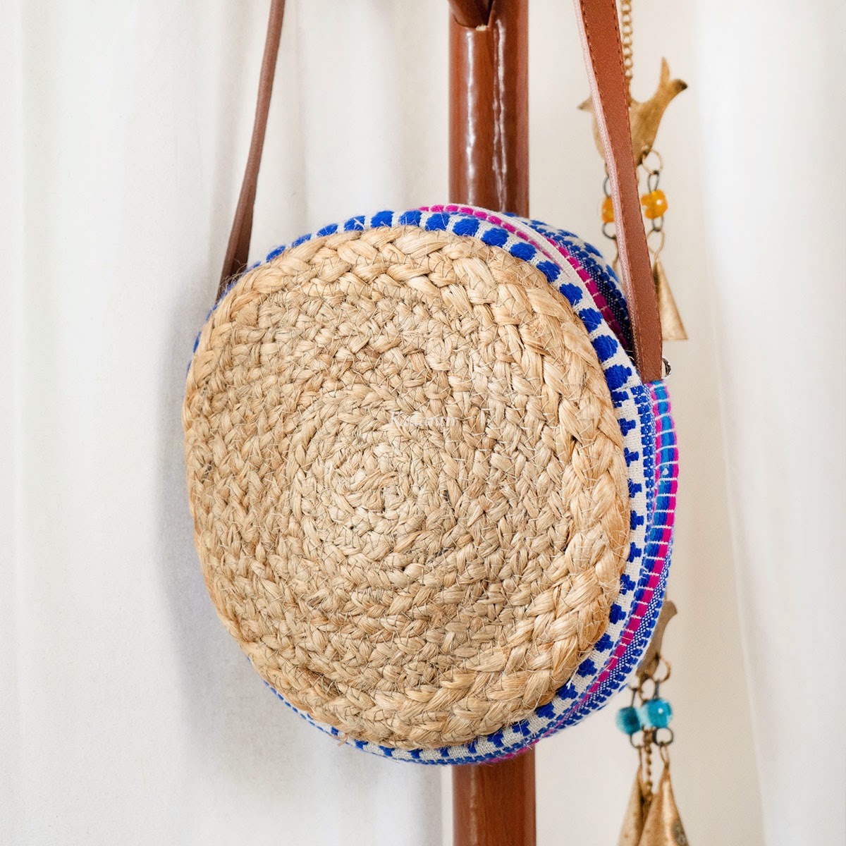 Round jute hotsell sling bag